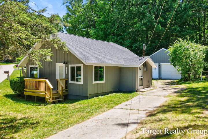 Property Photo: 8660 Merry Drive NE MI 49341