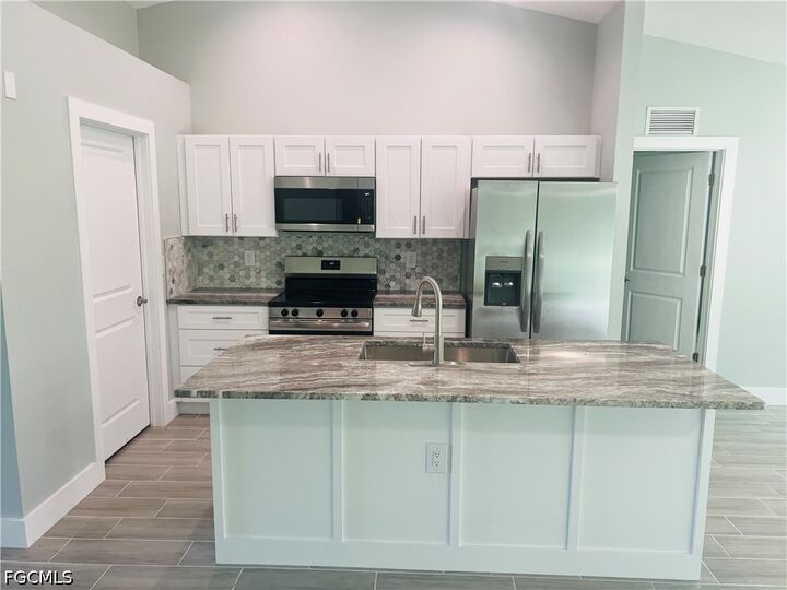 Property Photo: 4169 NW 38th Place FL 33993