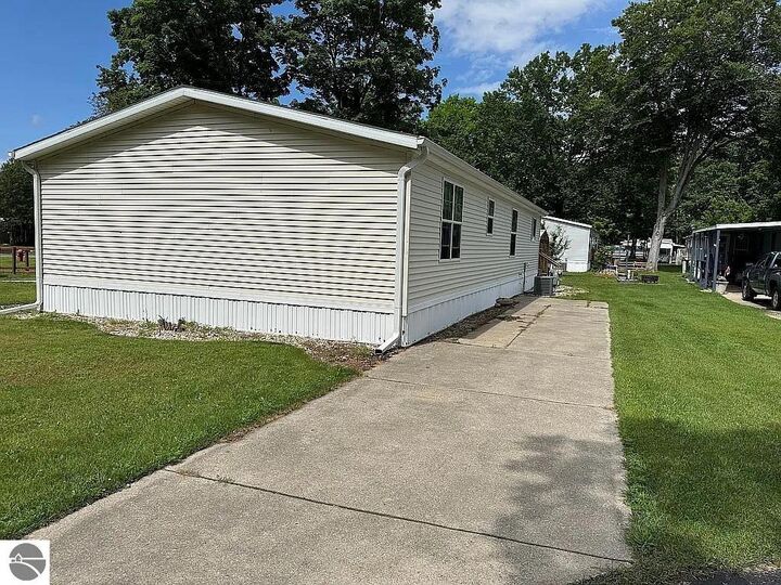 Property Photo:  714 Golfview Circle  MI 49629 