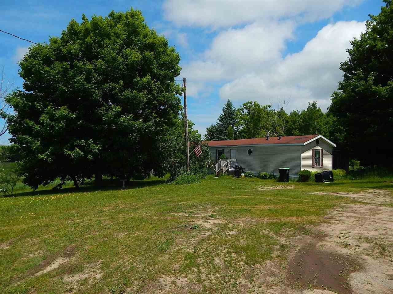 Property Photo:  3835 US 131 Hwy  MI 49770 