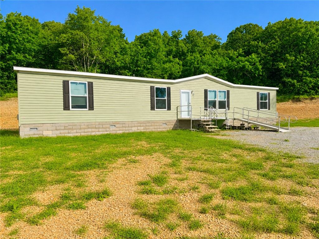 Property Photo:  723 Industrial Park Drive  MO 64831 