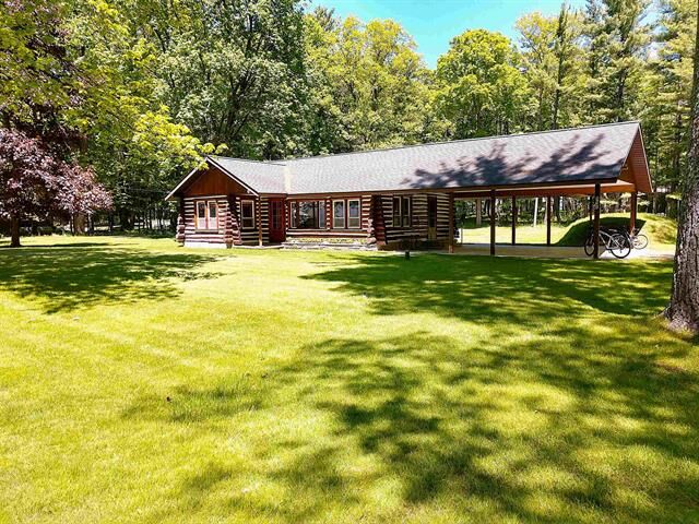 Property Photo:  8646 Deadstream Road  MI 49640 