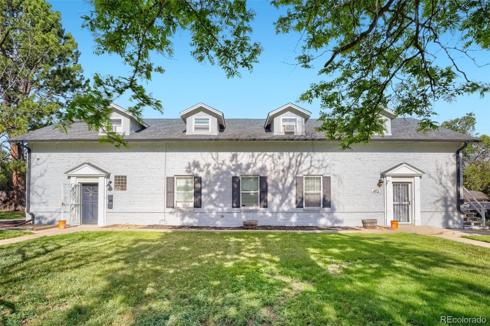 Property Photo:  493 Fulton Street  CO 80010 