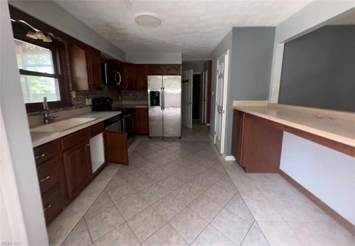 Property Photo: 7404 Christopher Newport Ave VA 23062