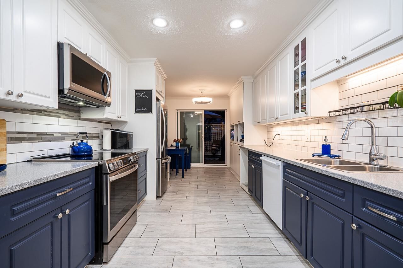 Property Photo: 5641 201 Street 134 BC V3A 8A4