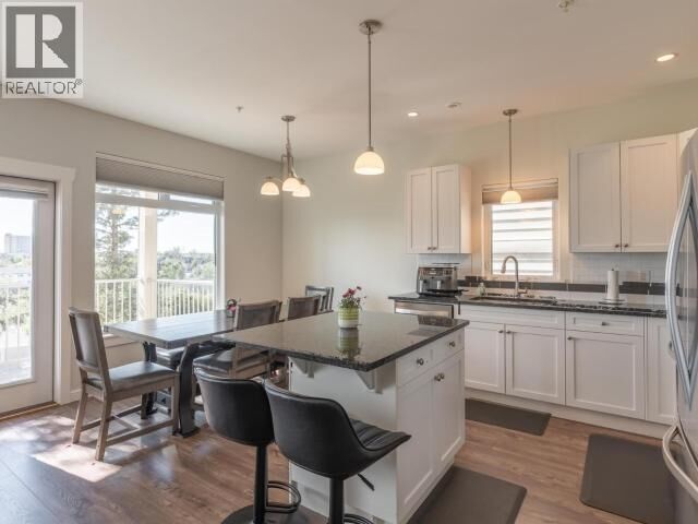 Property Photo:  102-5009H 44 Street  NT X1A 0E3 