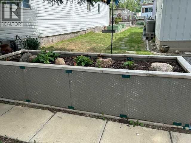 Property Photo: 56 Greenbrook Village East AB T1R 0R7
