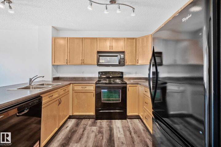 Property Photo:  13830 150 Avenue NW 207  AB T6V 1X2 