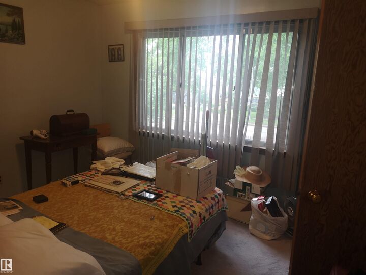 Property Photo:  8751 76 Avenue NW  AB T6C 0J4 