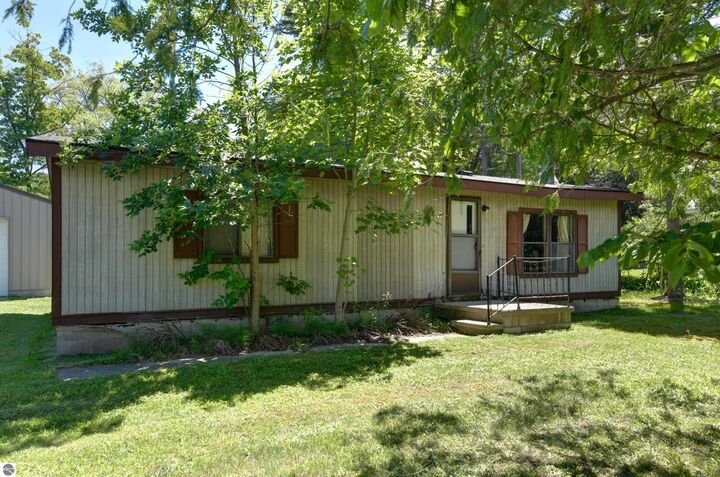 Property Photo:  2576 N Four Mile Road  MI 49686 