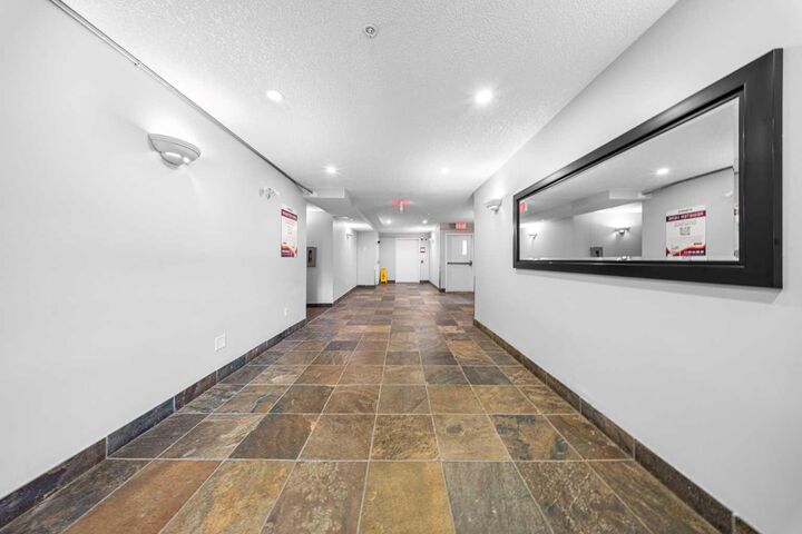 Property Photo: 70 Panamount Drive NW 1104 AB T3K 6K3