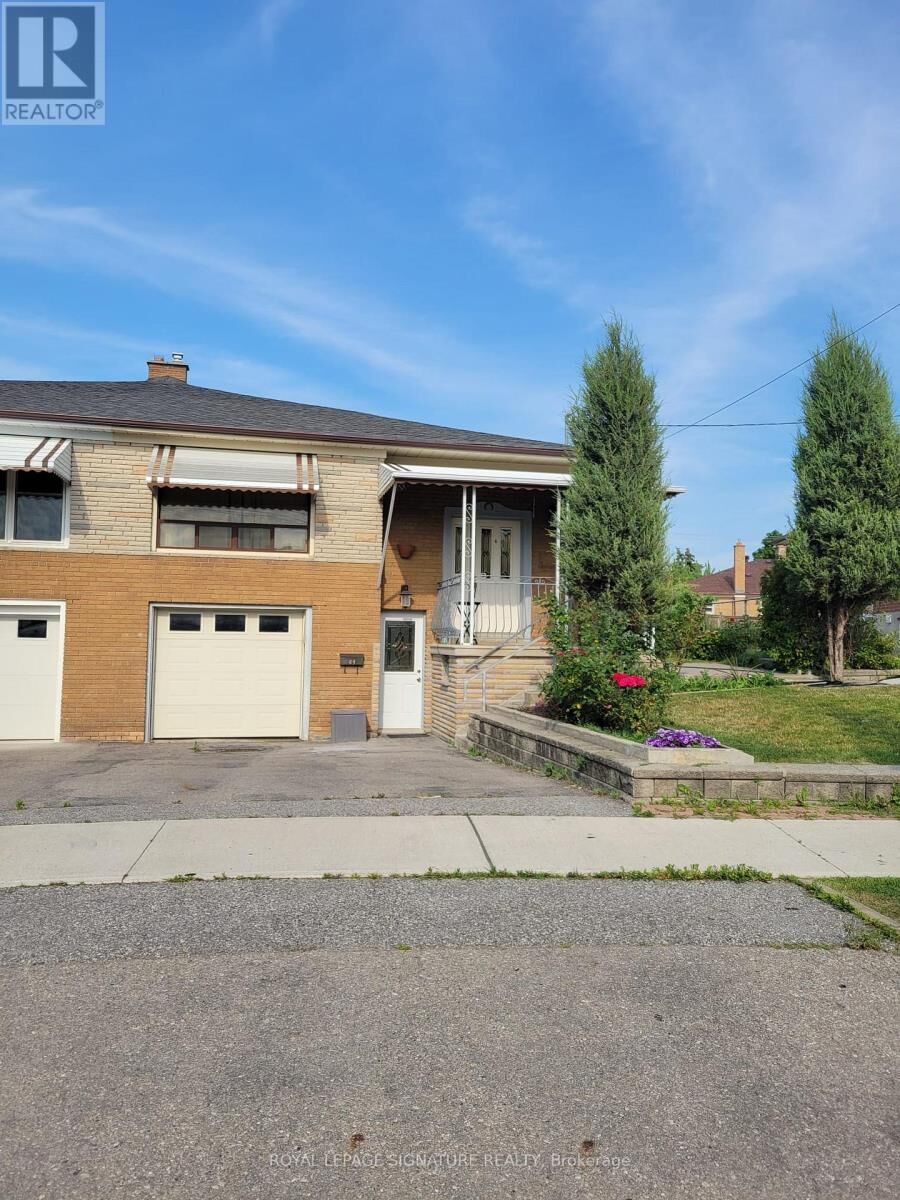 Property Photo:  64 Watney Crescent Lower  ON M3L 2C9 