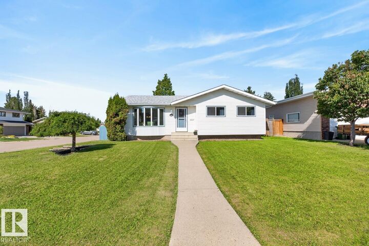 Property Photo:  6930 11 Avenue NW  AB T6K 3J5 