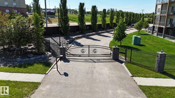 Property Photo: 5201 Brougham Drive 204 AB T7A 0C8