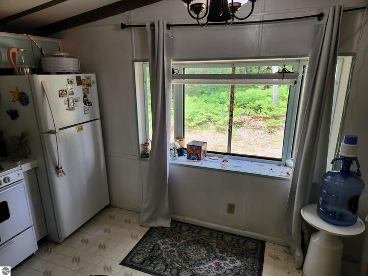 Property Photo: 5446 Blue Lake Road, NE MI 49646