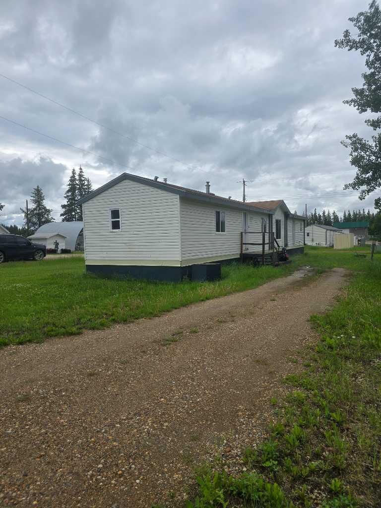 Property Photo: 72133 Range Road 11 302 AB T0H 1B0