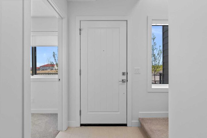 Property Photo: 132 Quesnay Wood Link SW AB T3E 8H6