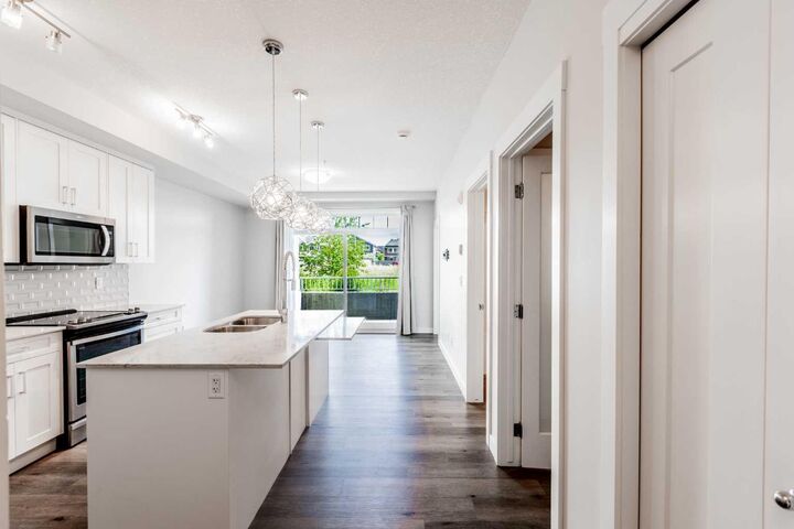 Property Photo:  300 Auburn Meadows Common SE 111  AB T3M 3E7 