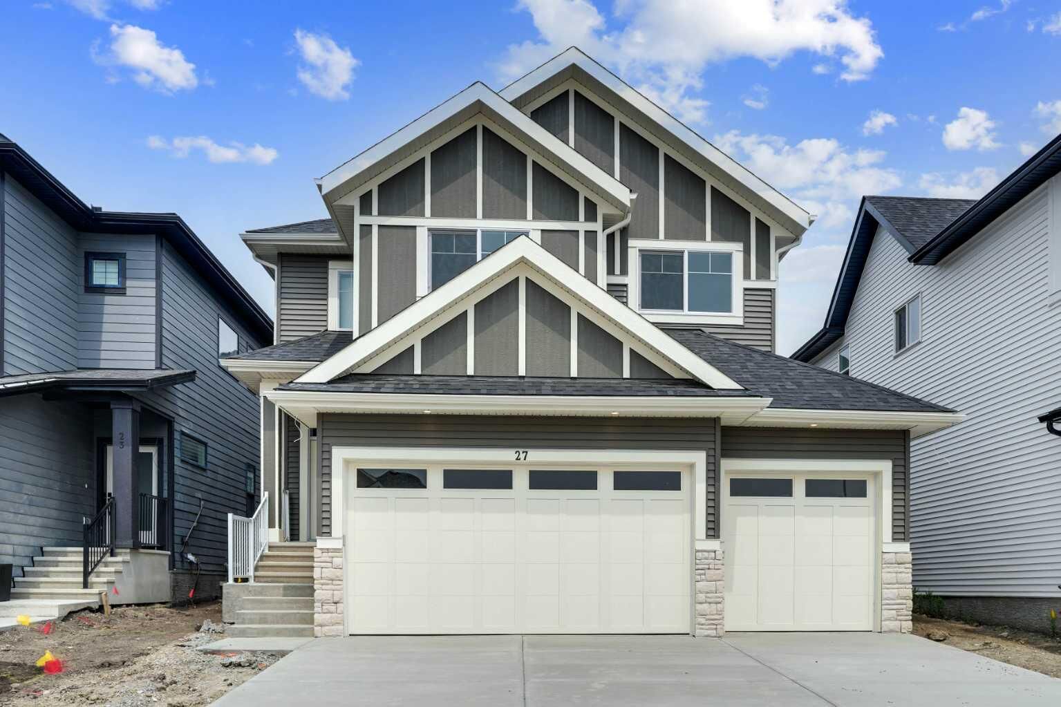 Property Photo: 27 Heritage Close AB T4C 3G8