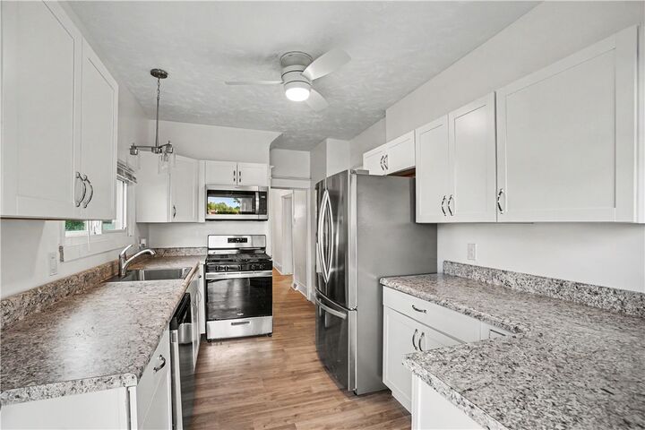 Property Photo:  1311 Pirl St  PA 15132 