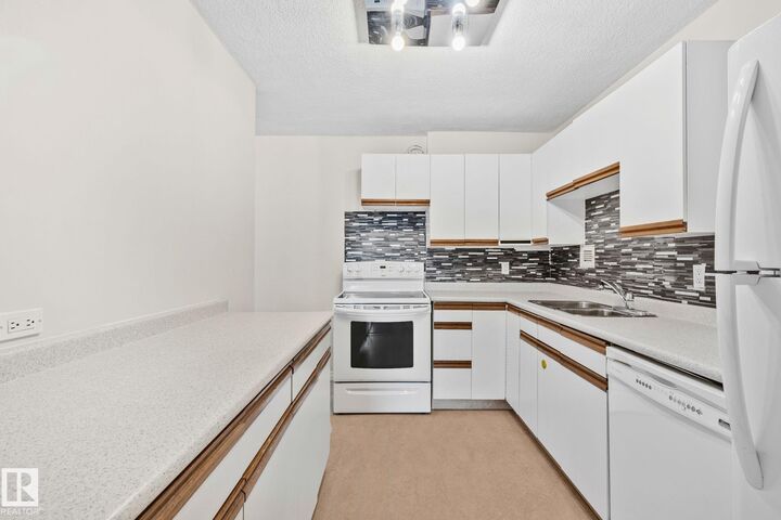 Property Photo:  9940 112 Street NW 205  AB T5K 1L8 