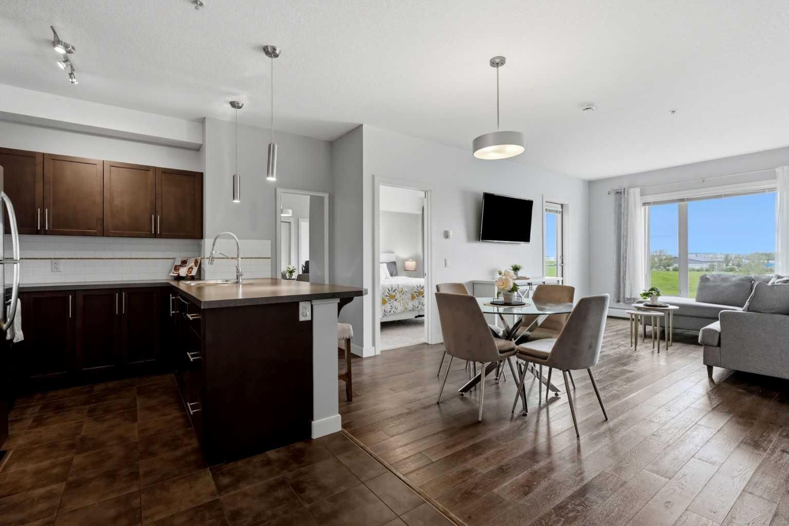 Property Photo: 604 East Lake Boulevard NE 2330 AB T4A 0G6