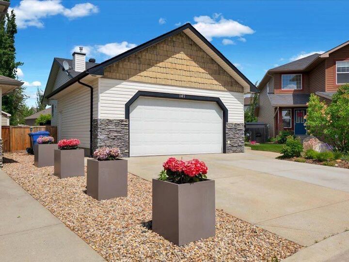 Property Photo: 147 Cove Place AB T1X 1J6