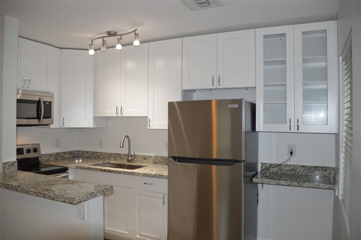 Property Photo: 819 NE 14th Court B FL 33304