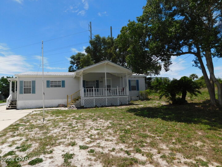 Property Photo:  606 Malaga Place  FL 32413 