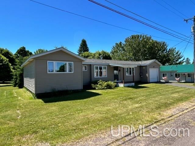 Property Photo:  124 Stanton Avenue  MI 49950 