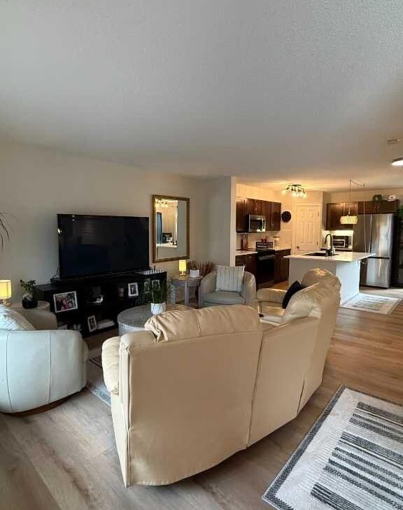 Property Photo: 102 Panatella Park NW AB T3K 6K4