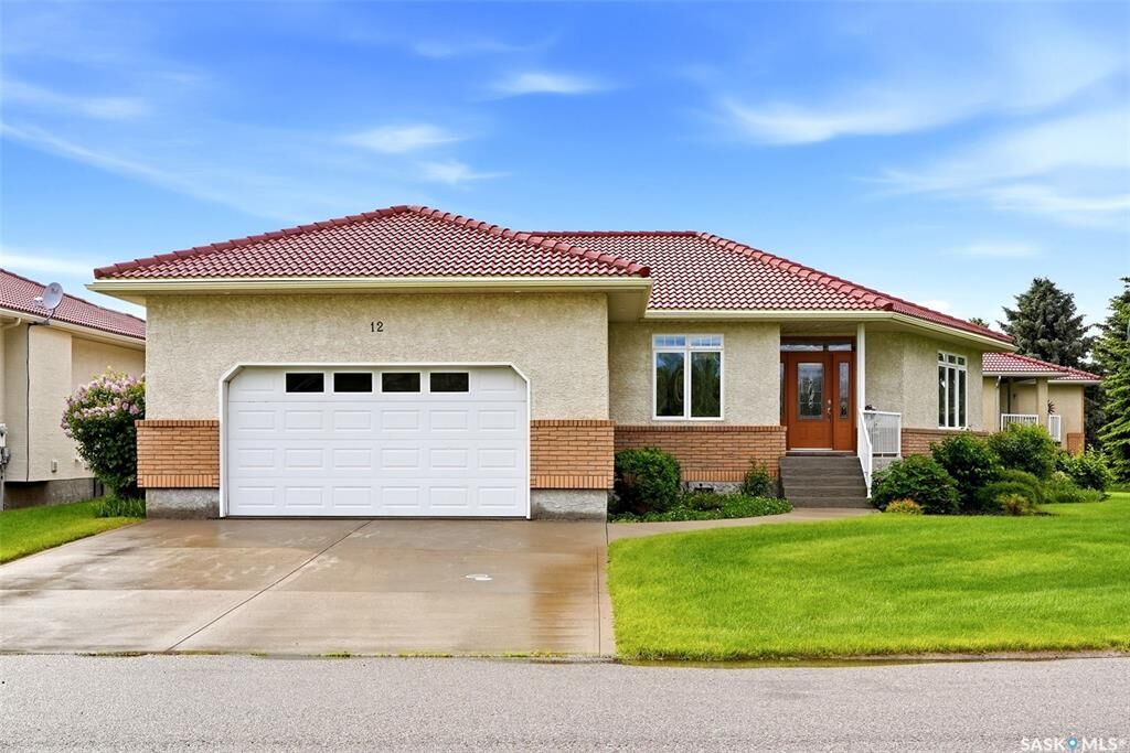 Property Photo:  12 St Andrews Bay  SK S4L 1A2 