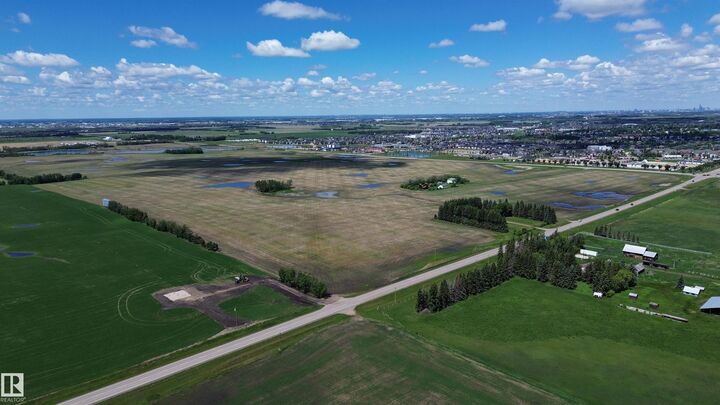Property Photo:  24209 Hwy 625  AB T4X 1E4 