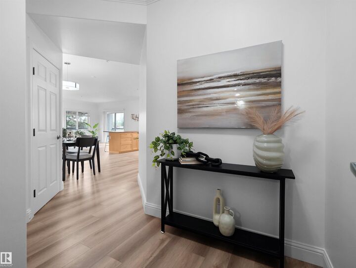 Property Photo:  14612 125 Street NW 104  AB T5X 0B6 