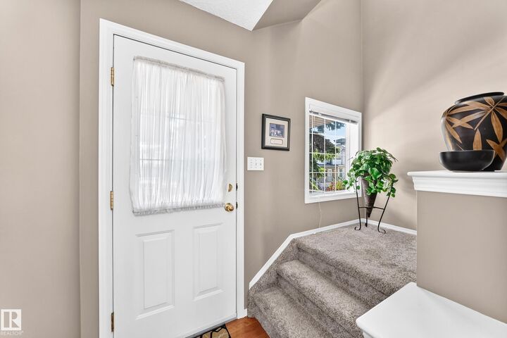 Property Photo:  14803 Miller Boulevard NW 6  AB T5Y 3A4 