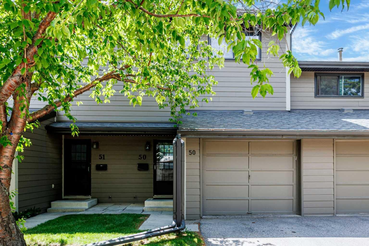 Property Photo:  5019 46 Avenue SW 50  AB T3E 6R1 