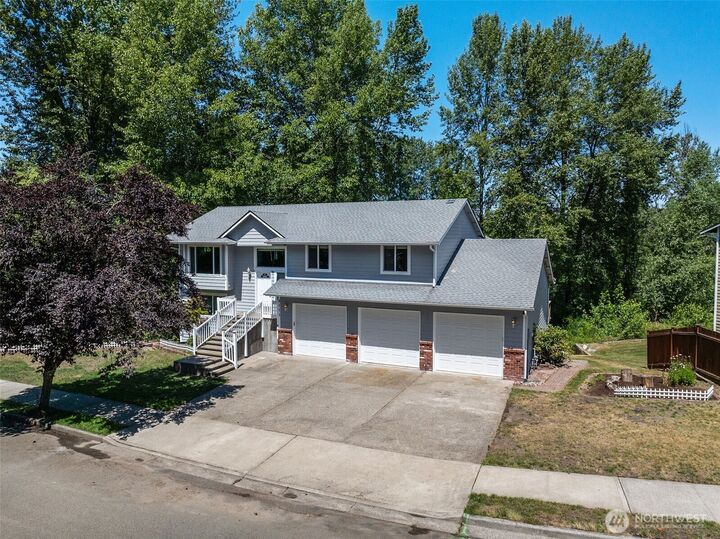 Property Photo:  2111  22nd Ave SE  WA 98372 