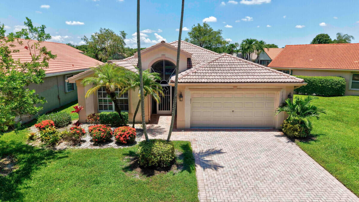 Property Photo: 11709 Castellon Court FL 33437