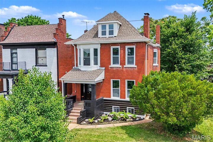 Property Photo:  3911 Sullivan Avenue  MO 63107 
