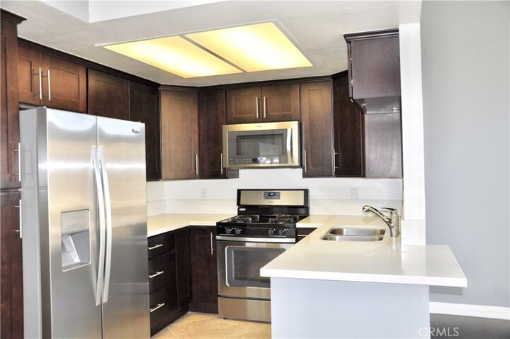 Property Photo:  61 Alicante Aisle 65  CA 92614 