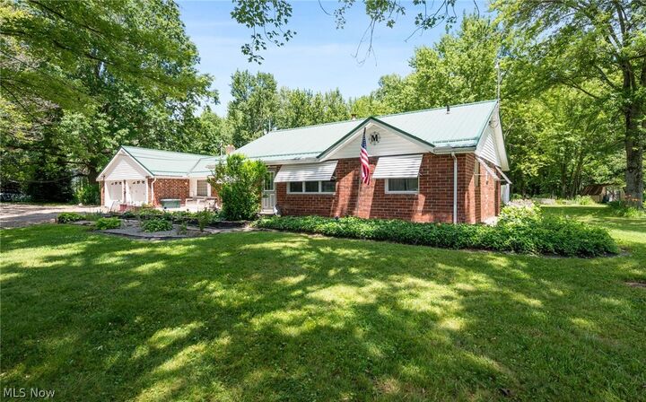 Property Photo:  5950 Parkman Road NW  OH 44481 