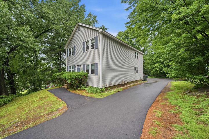 Property Photo:  33 Elwood Avenue  NH 03103 