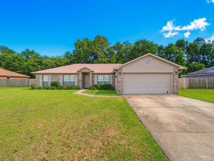 Property Photo:  6998 Harvest Way  FL 32570 