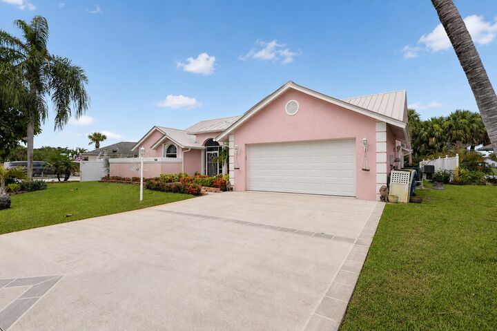 Property Photo:  1921 NE Acapulco Drive  FL 34957 