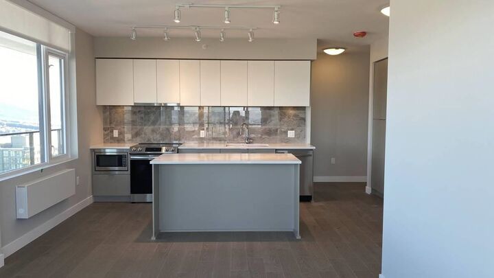 Property Photo:  8725 University Crescent 1901  BC V5A 0A3 