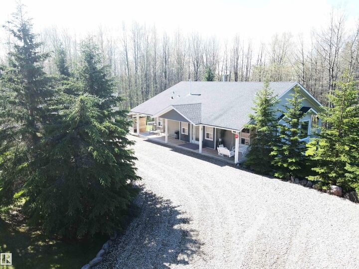 Property Photo: 74 465022 Range Road 61 AB T0C 0T0
