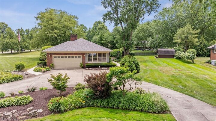 Property Photo: 4122 Devon Drive SE OH 44484
