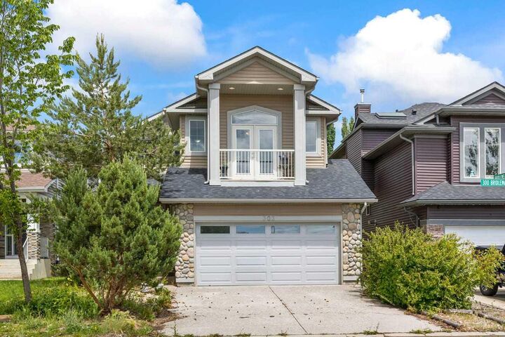 303 Bridlemeadows Common SW — photo 1