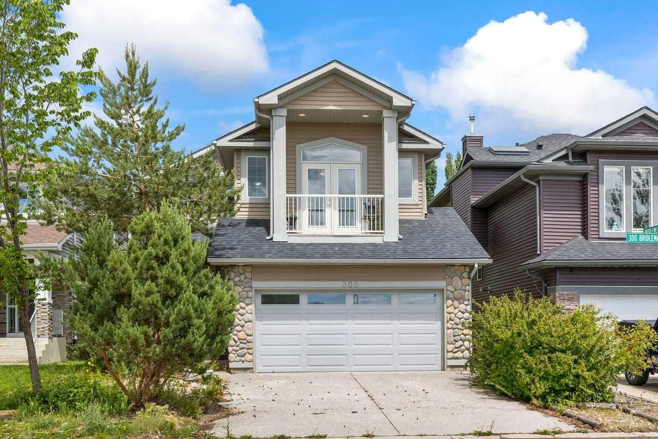 Property Photo: 303 Bridlemeadows Common SW AB T2Y 5C4