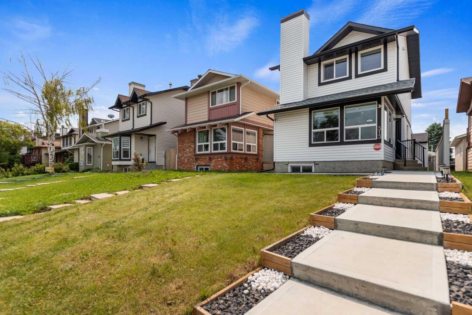Property Photo:  313 Falwood Way NE  AB T3J 1A9 